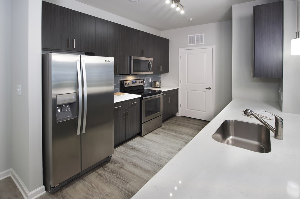 Stainless steel appliances in open concept kitchens