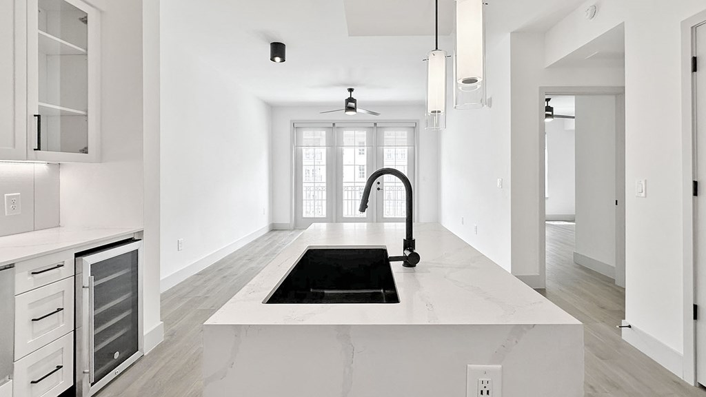 Open-concept floor plans with overhead lighting