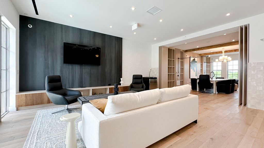 Multi-story clubhouse with lounges, kitchen and entertaining areas