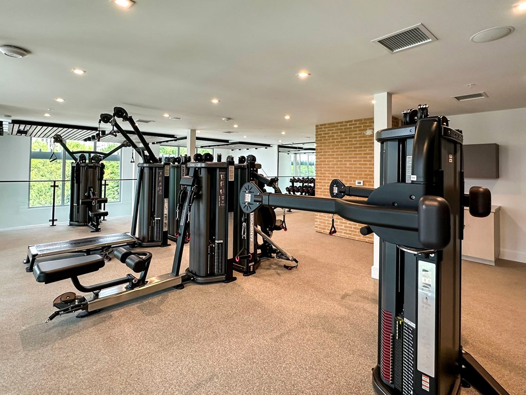 Bi-level fitness studio with weight machines