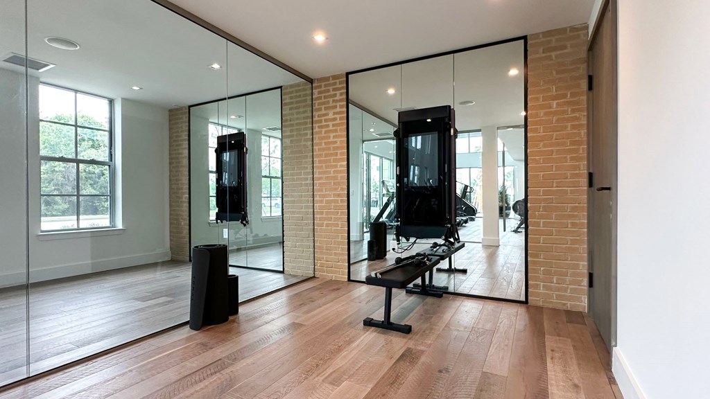 fitness studio with two Tonal all-in-one machines