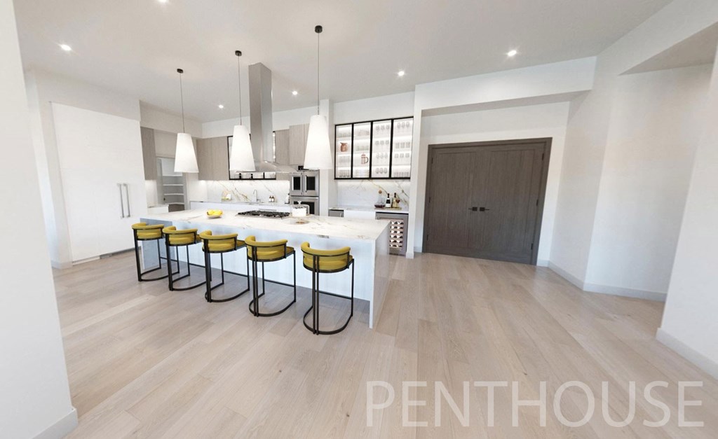 Large kitchen island in Penthouse