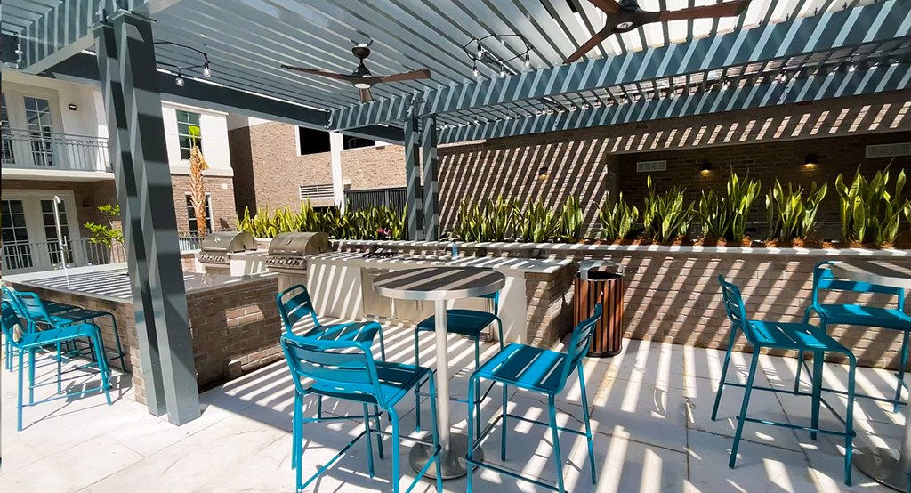 Lounge with grills at Legacy Patriots Point Apartments