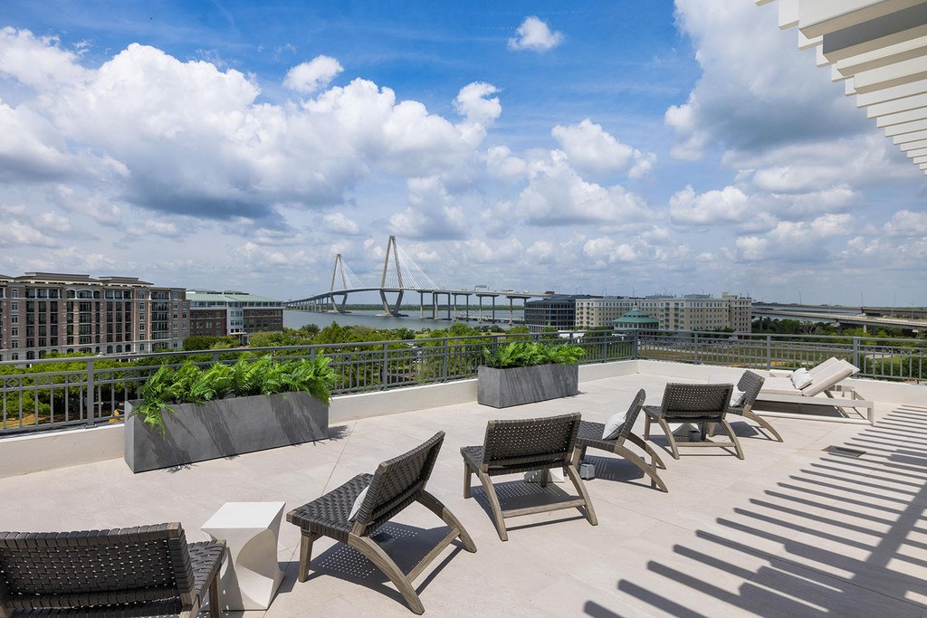 Expansive rooftop terrace with breathtaking views overlooking Charleston Harbor