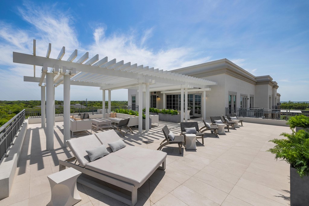 Expansive rooftop terrace with breathtaking views overlooking Charleston Harbor