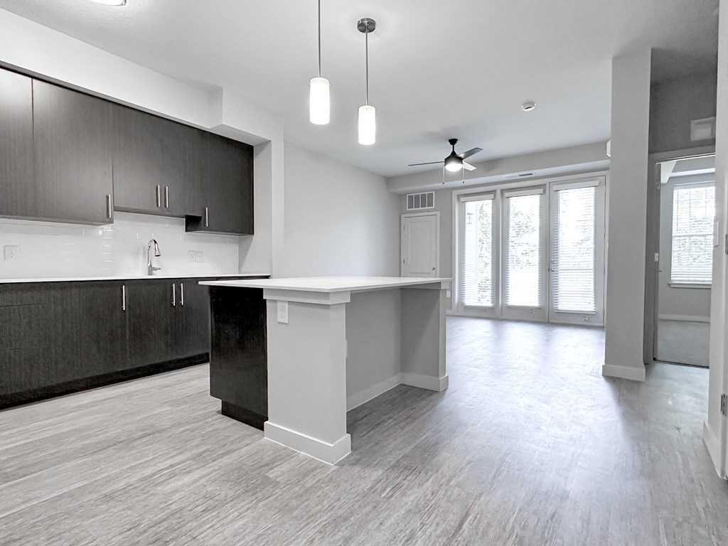 Open-concept floor plans with hardwood-inspired flooring