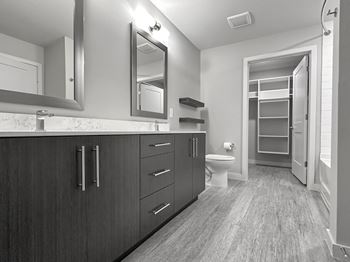 Dual vanities and framed mirrors in bathrooms