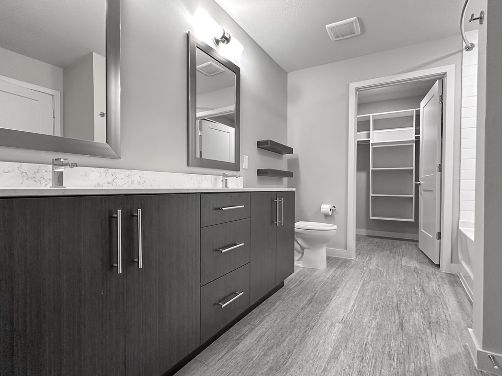 Bathrooms with quartz countertops, garden soaking tubs and California-style* walk-in closets