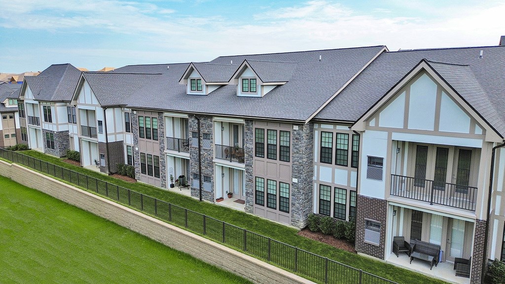 Exterior of building 1 with wooded views