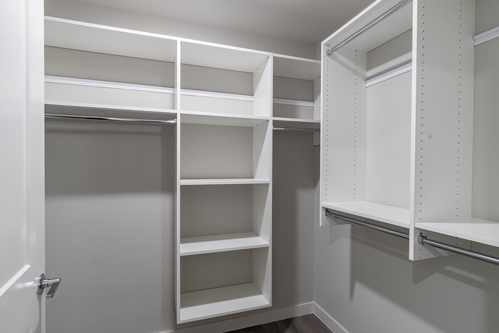 Bedrooms with overhead lighting and ceiling fan