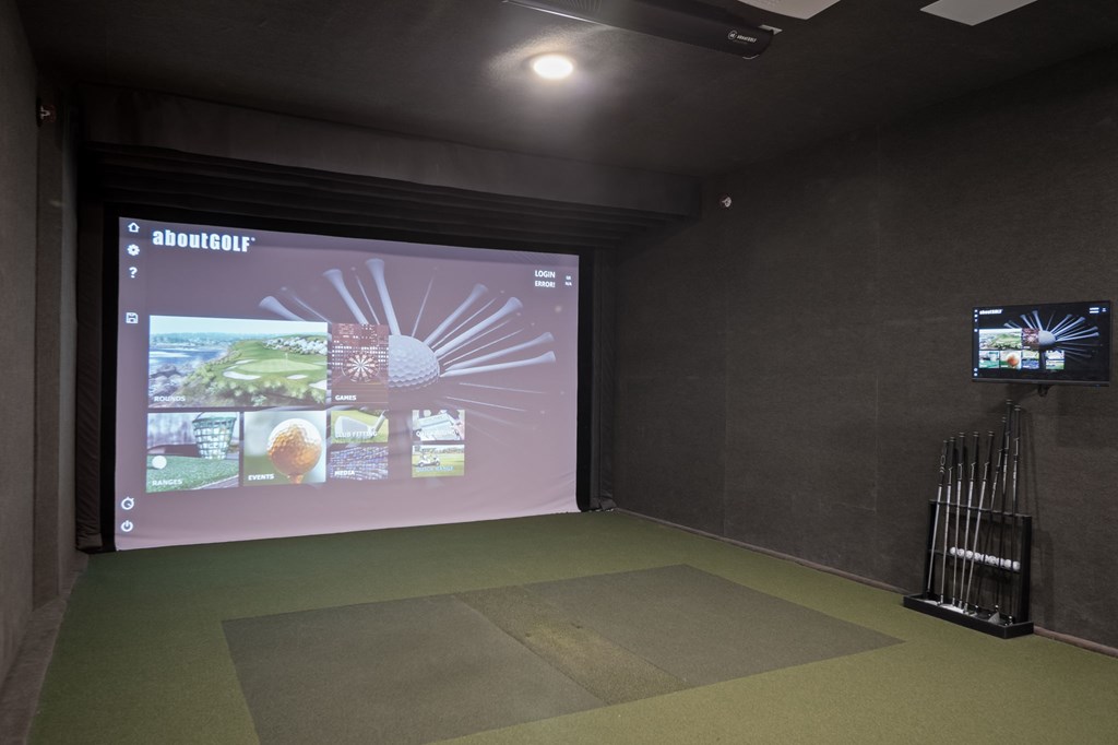 Golf simulator in game room
