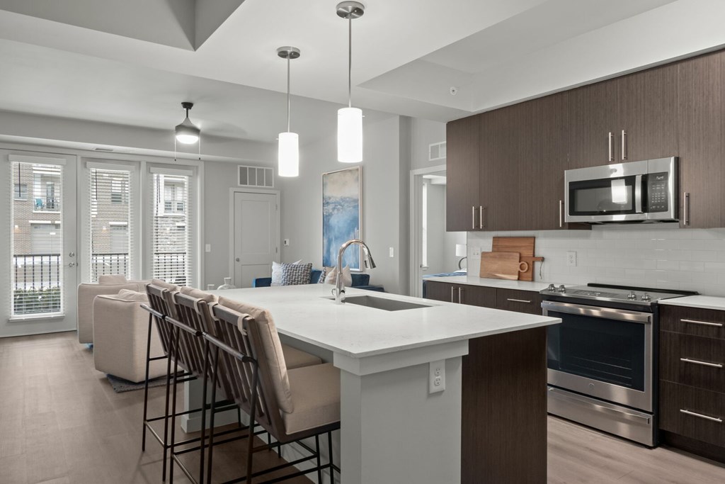 Fully-equipped kitchens with electric top ranges, double-sided refrigerators, built-in microwaves and dishwashers