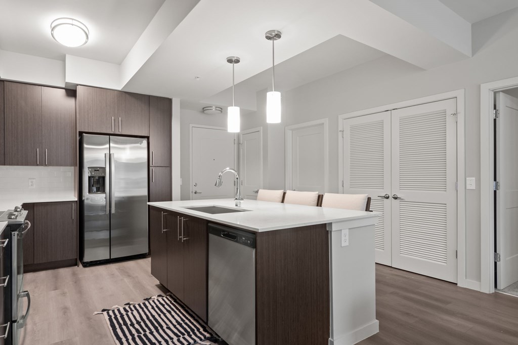 Fully-equipped kitchens with electric top ranges, double-sided refrigerators, built-in microwaves and dishwashers