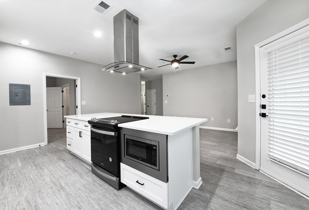 Newly renovated suites include quartz countertops, stainless steel appliances and matte black finishes and hardware (Legacy)