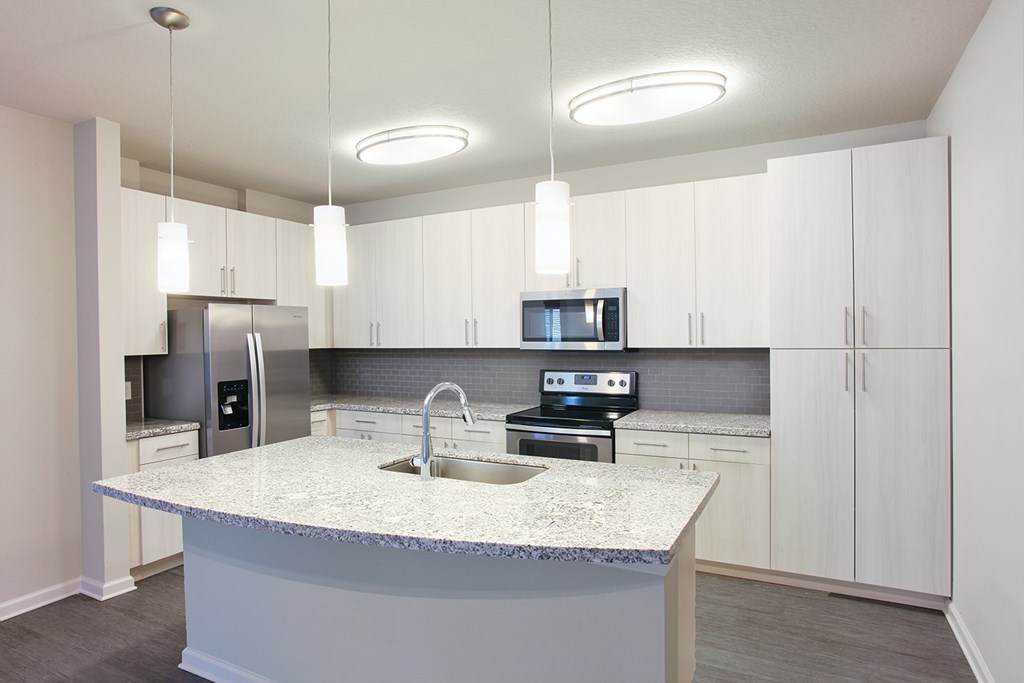 Stainless steel appliances in open concept kitchens