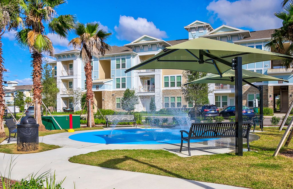 New splash pad, swing benches and charcoal grill area