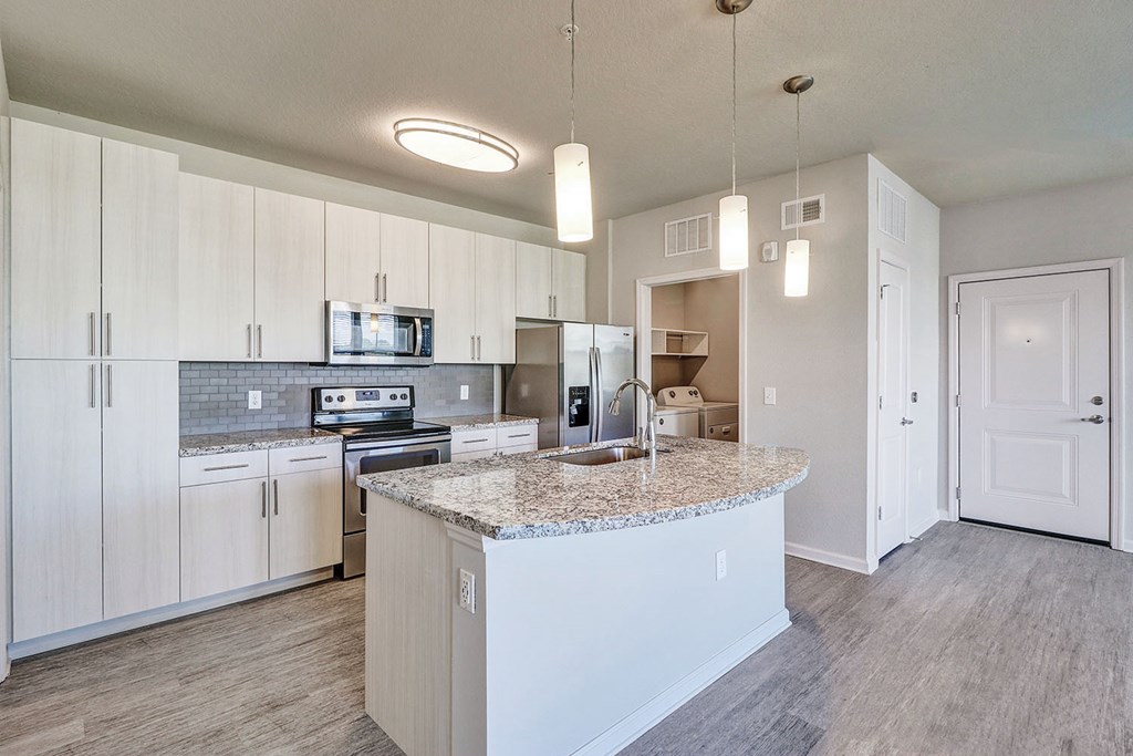 Phase II units include granite countertops and hardwood-inspired flooring throughout