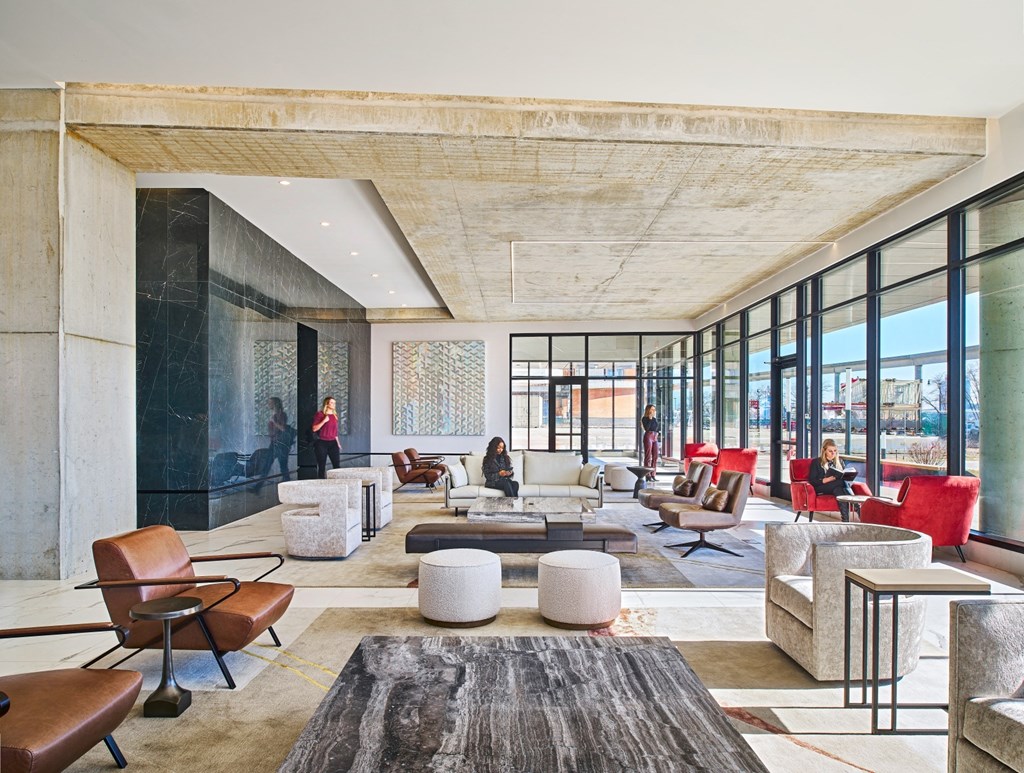 A large open space with people sitting and chatting.