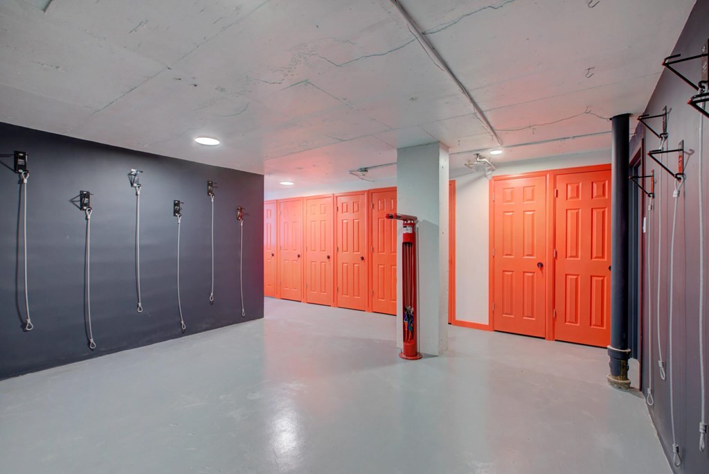 Storage area features bike storage and individual storage rooms.