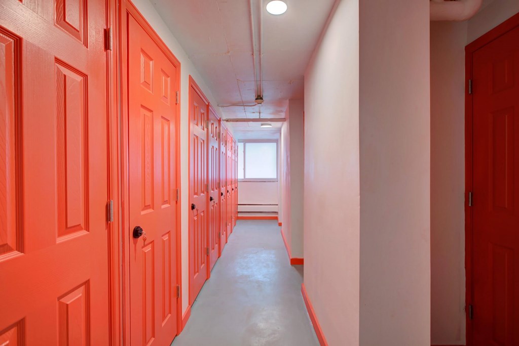 Storage rooms with red doors.