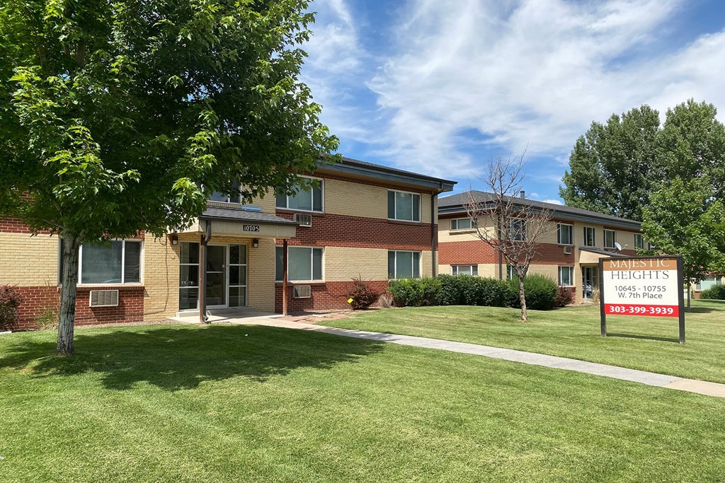 A sign in front of a building that says