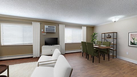 A living room with a white couch and a television.