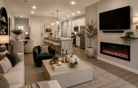 A modern living room with a fireplace and a television mounted on the wall.