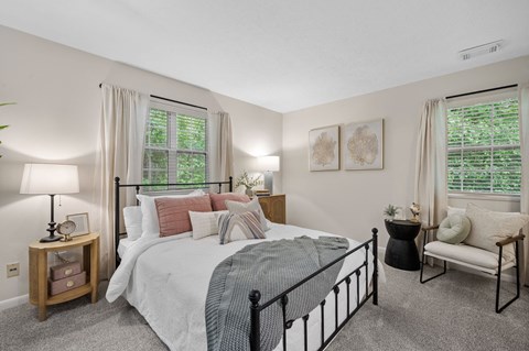 Bedroom with a large bed at Concord Place Apartments, Mentor, 44060