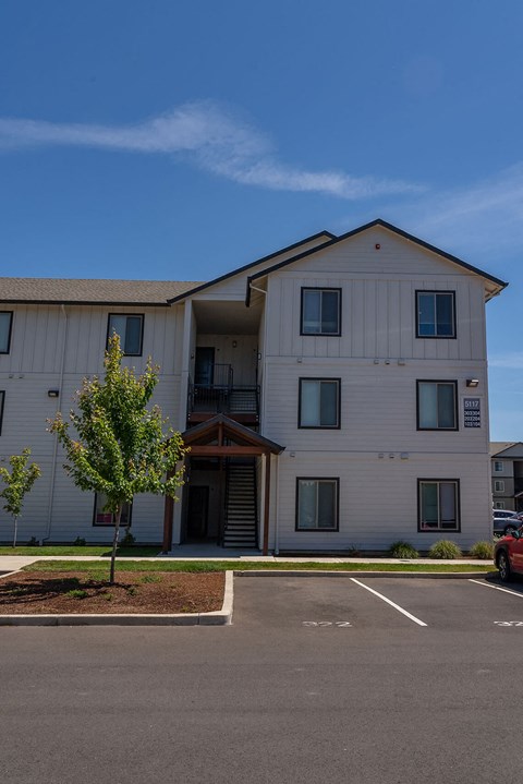 A building with a parking lot in front of it at Northplace Apartment Homes, Salem, Oregon