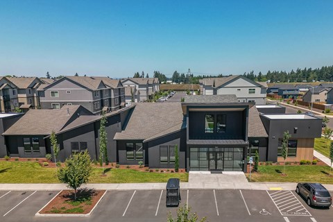 A row of houses with a car parked in front of them at Northplace Apartment Homes, Salem, OR, 97305