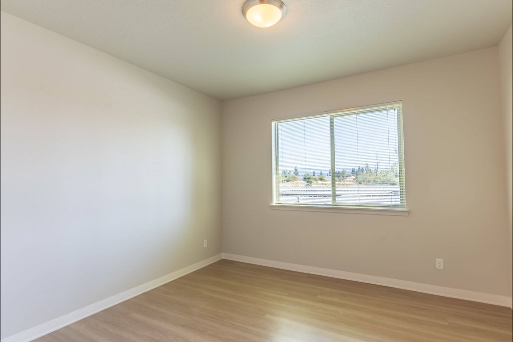 Empty room with a window at Cascade Place Apartment Homes, Molalla, OR, 97038