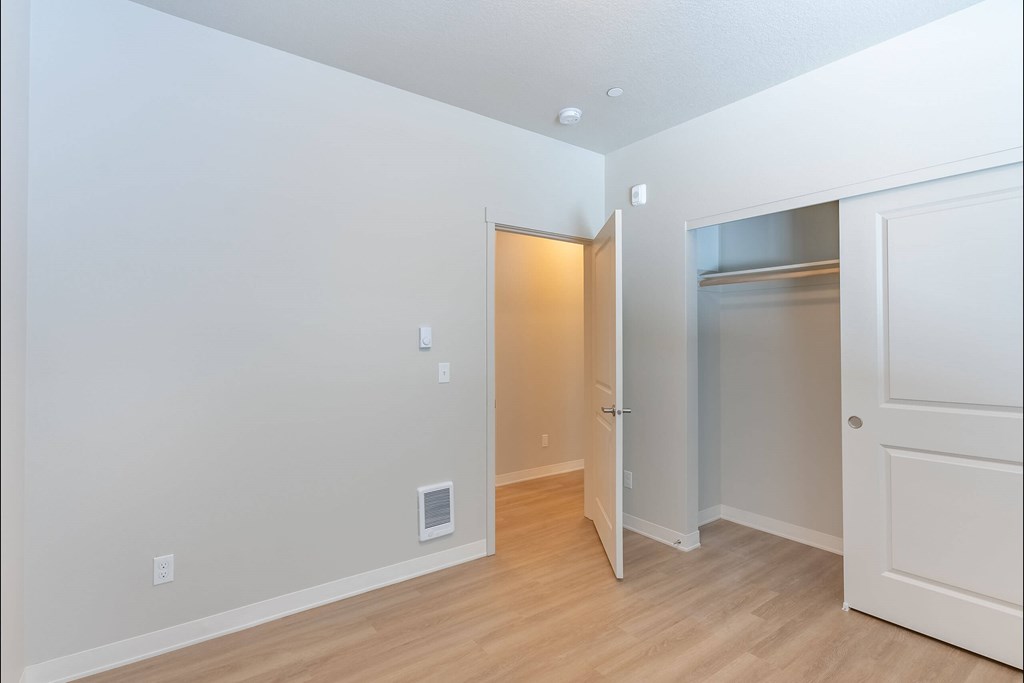 A room with a white door and a white wall at Cascade Place Apartment Homes, Molalla, Oregon