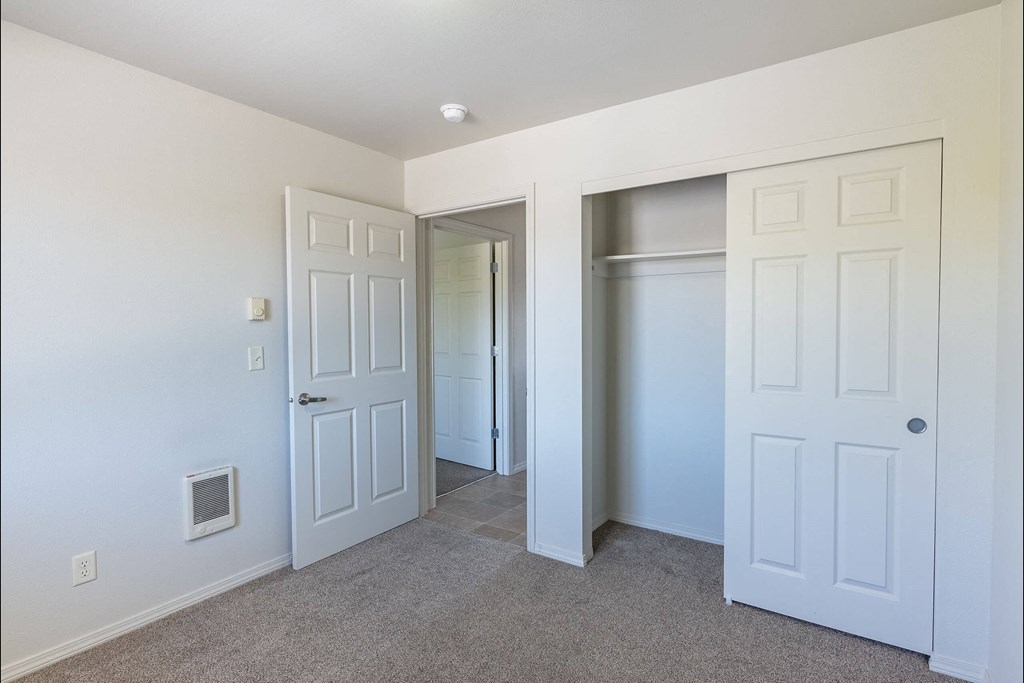 A white door is on the left side of the image at Stoneplace Apartment Homes, Molalla