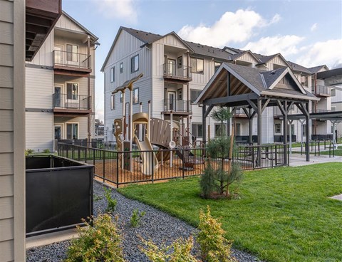 A residential area with houses and a playground.