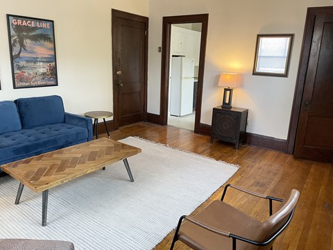 Hardwood floors throughout, coved moldings.