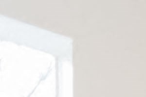 4-person dining in living area leads to hallway