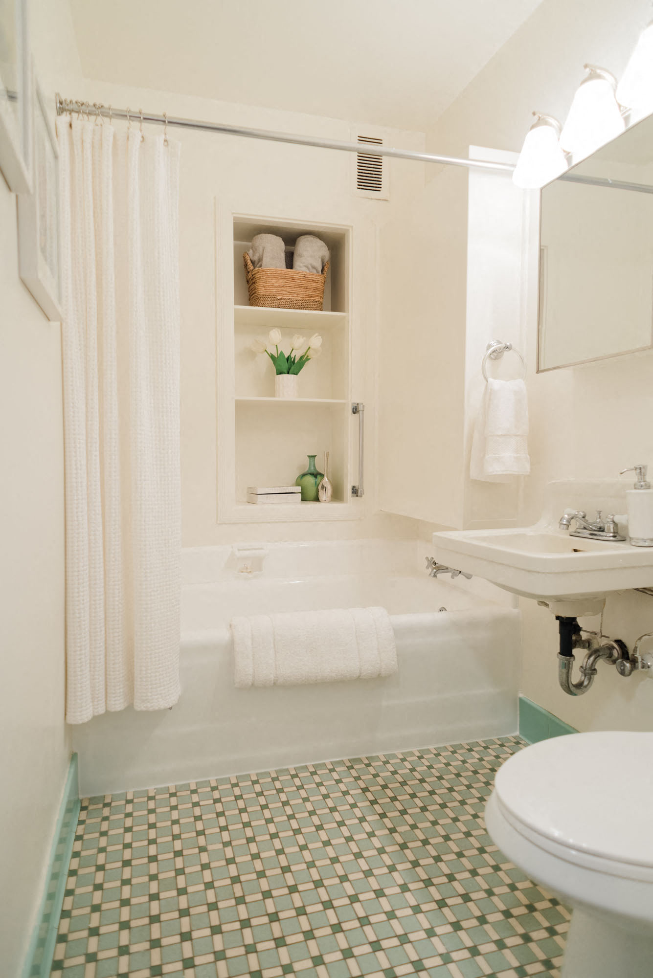 master bath with vintage tile and built-in shelving