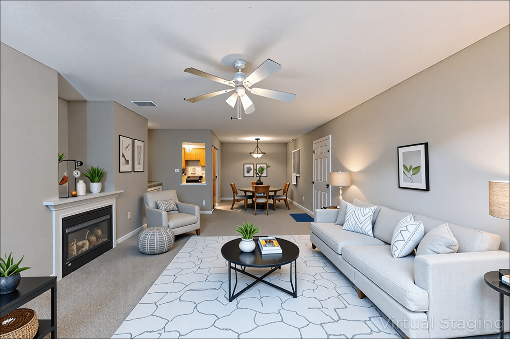 A living room with a fireplace and a couch.