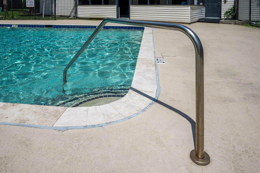 A pool with a metal ladder at Brackenbrook Apartments, North Charleston 29418