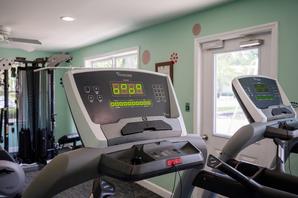 A treadmill with a digital display showing the time and a green background at Brackenbrook Apartments, North Charleston 29418