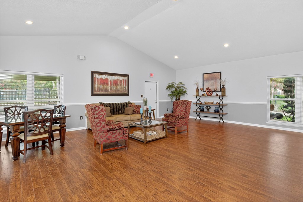 A living room with wooden floors and furniture. at North Bluff Apartments, North Charleston, SC, 29406