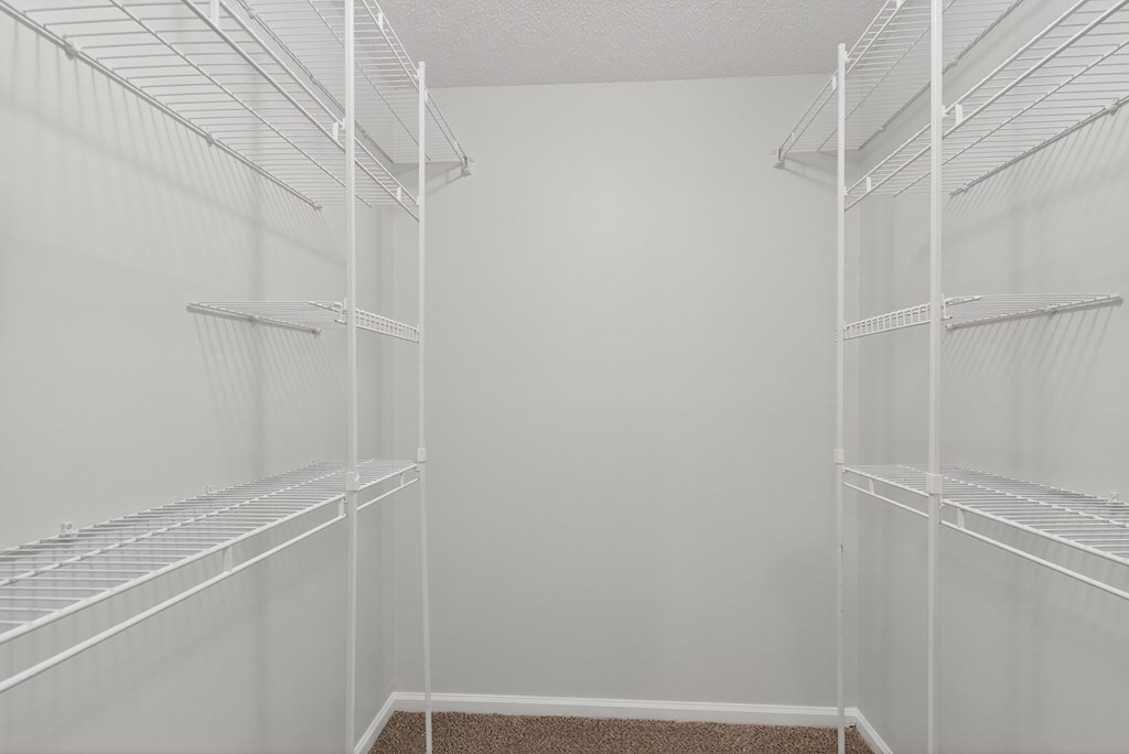 Empty white shelves in a room at North Bluff Apartments, North Charleston, SC