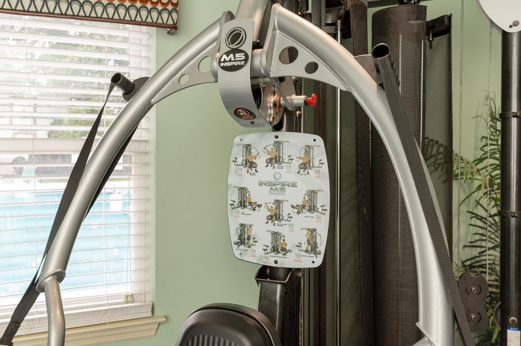 A close up of a piece of exercise equipment with a diagram on it at Sawbranch Apartments, Summerville, SC, 29485