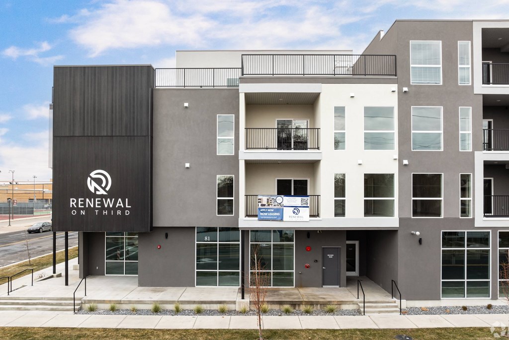 A modern building with the words Renewal on the side.