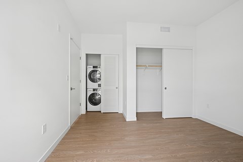 A laundry room with a washer and dryer.at 1915 Park, Los Angeles California