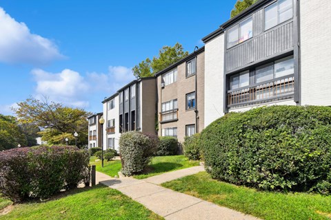 A residential area with apartment buildings and greenery.