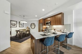 Decorated kitchen with island at Bayview Apartments, Emeryville, California, 94608