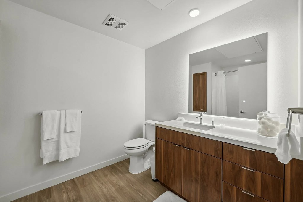 Bathroom with mirror at Bayview Apartments, California