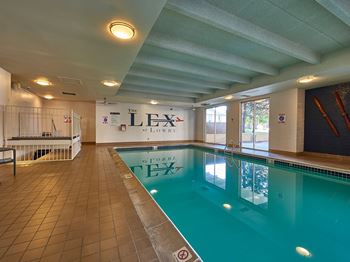 A large indoor swimming pool at The Lex At Lowry, Denver, 80224