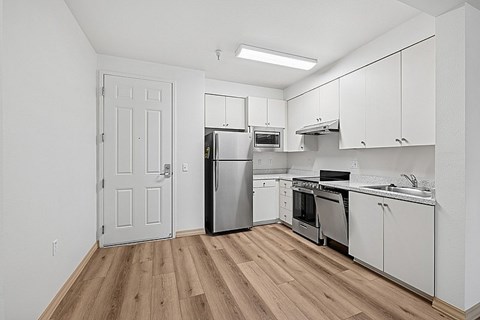 Kitchen with wooden floor at Parkview Living Apartments, California, 90026